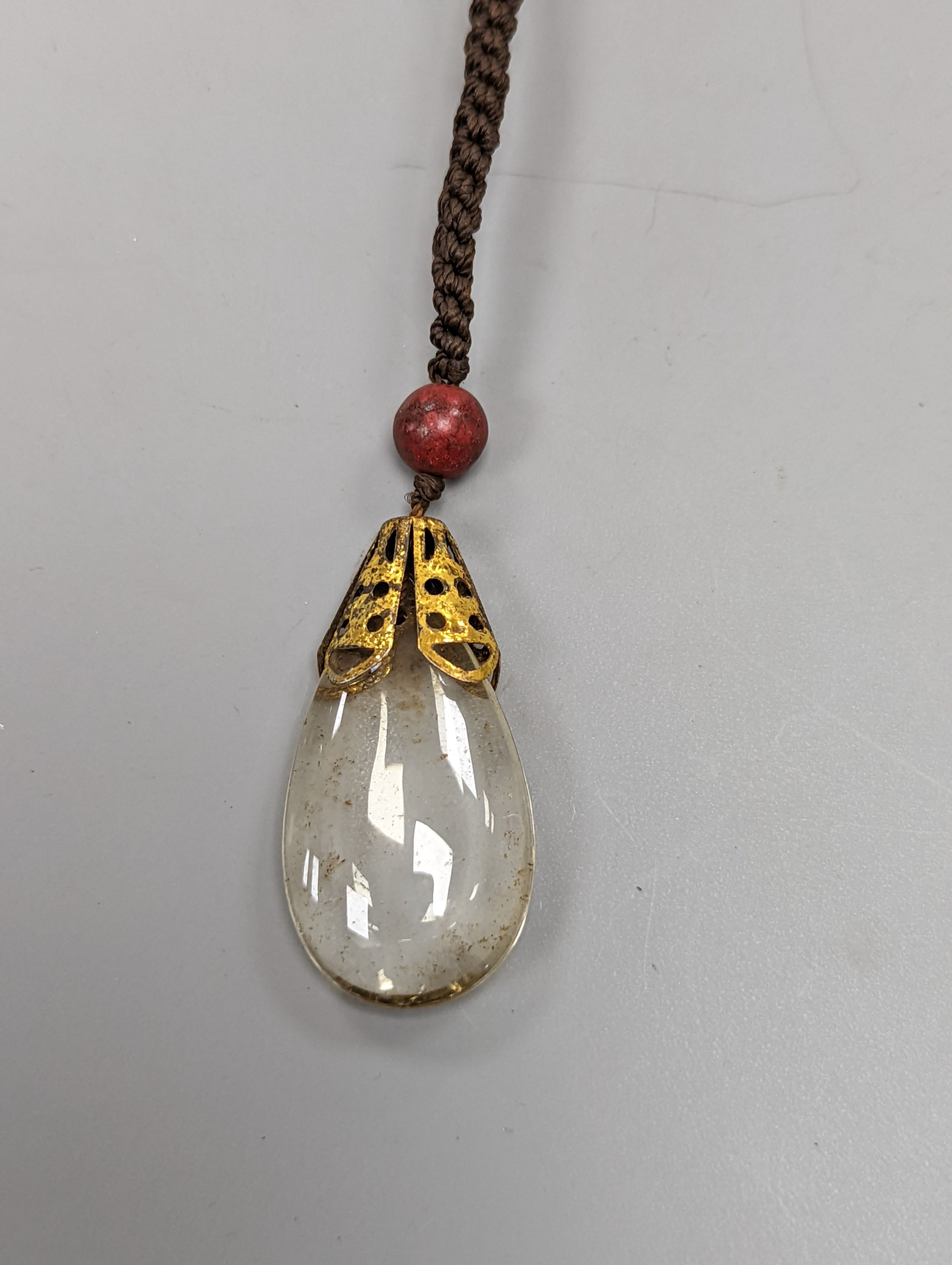 A Chinese turquoise matrix court style necklace in a hardwood box